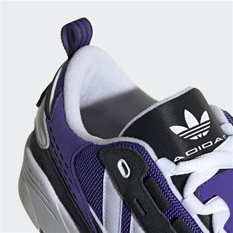 purple adidas shoes.